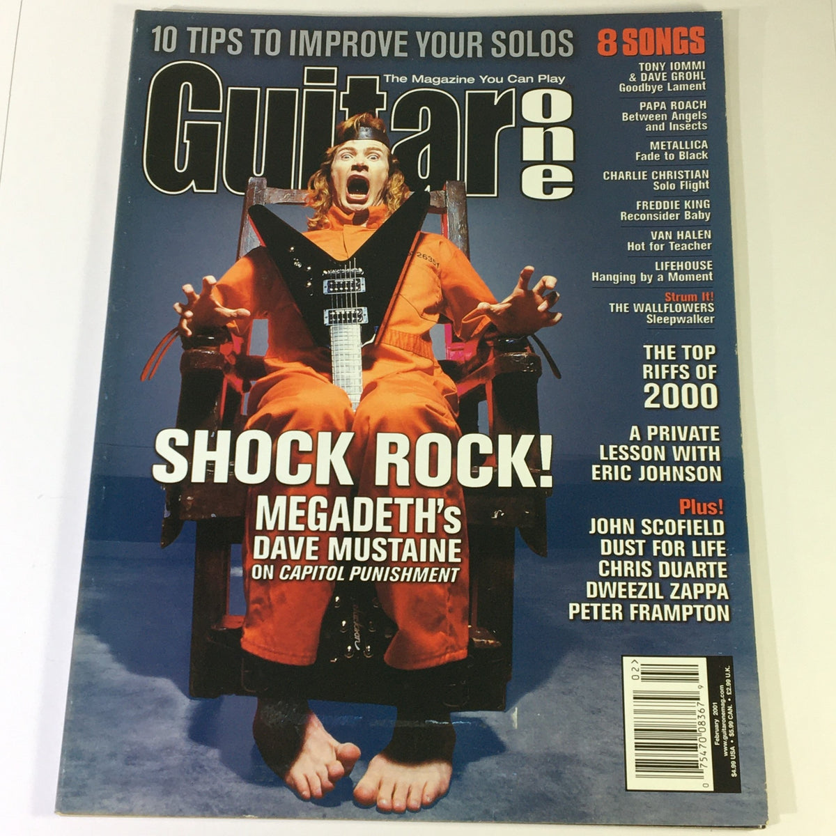 Cover of Guitar One Magazine February 2001, featuring Megadeth's Dave Mustaine in an iconic pose with the title 'Shock Rock!' and highlights including interviews with Tony Iommi, Dave Grohl, and others.