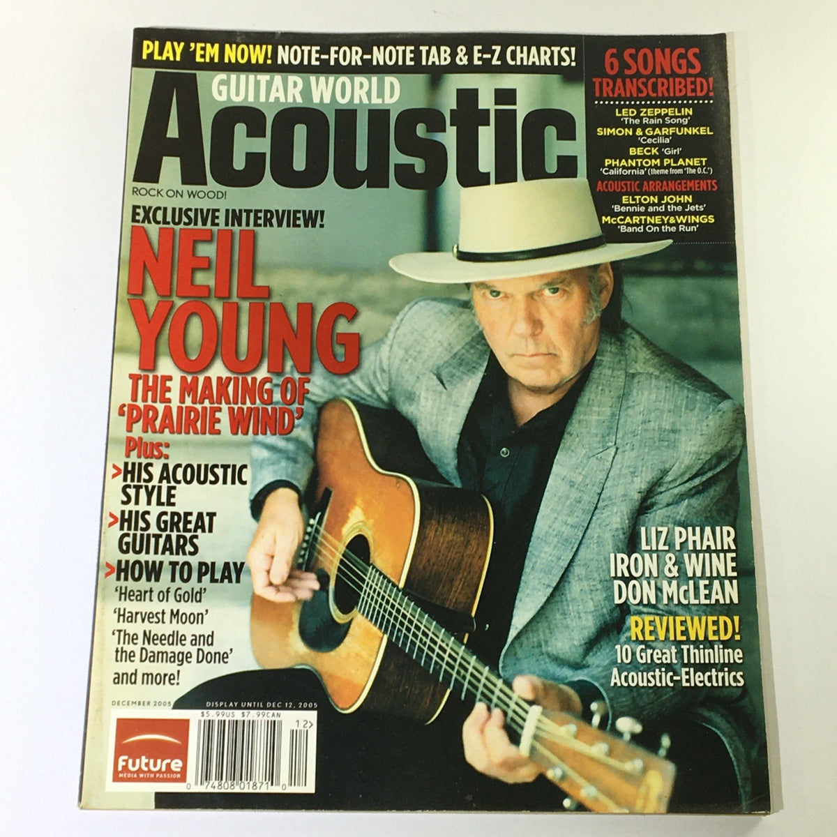 Cover of Guitar World Acoustic Magazine December 2005 featuring Neil Young with his guitar, highlighting his interview on 'Prairie Wind,' along with mentions of Liz Phair and Don McLean.