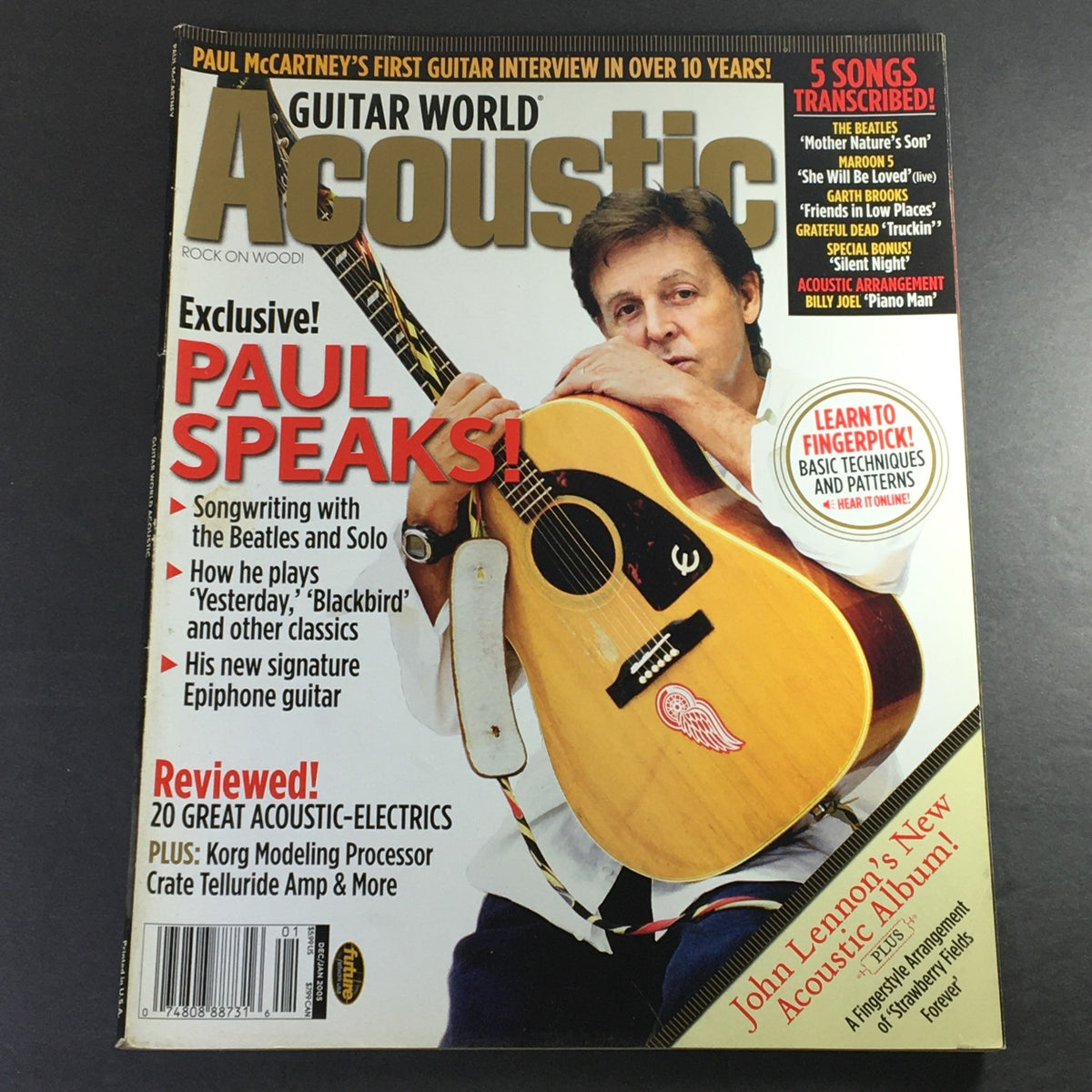 Cover of Guitar World Acoustic Magazine December January 2005 featuring Paul McCartney with an acoustic guitar. The magazine includes an exclusive interview and reviews of acoustic instruments.