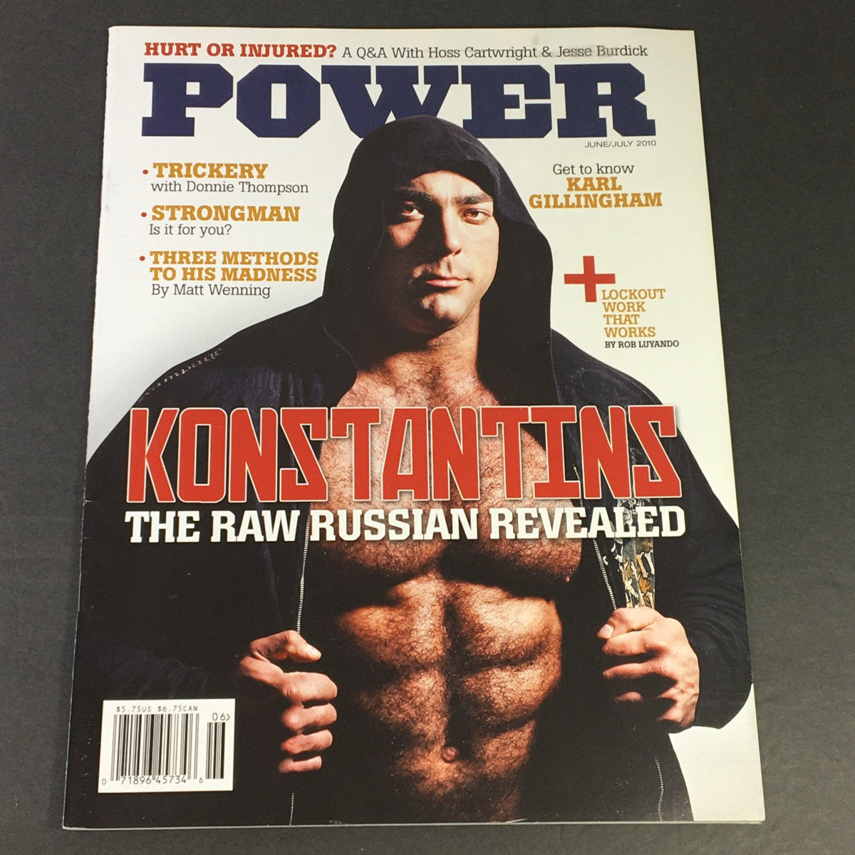 Power Magazine June July 2010 #4 featuring Konstantīns Konstantinovs, showcasing the raw strength and competitive spirit of powerlifting with a striking cover image.