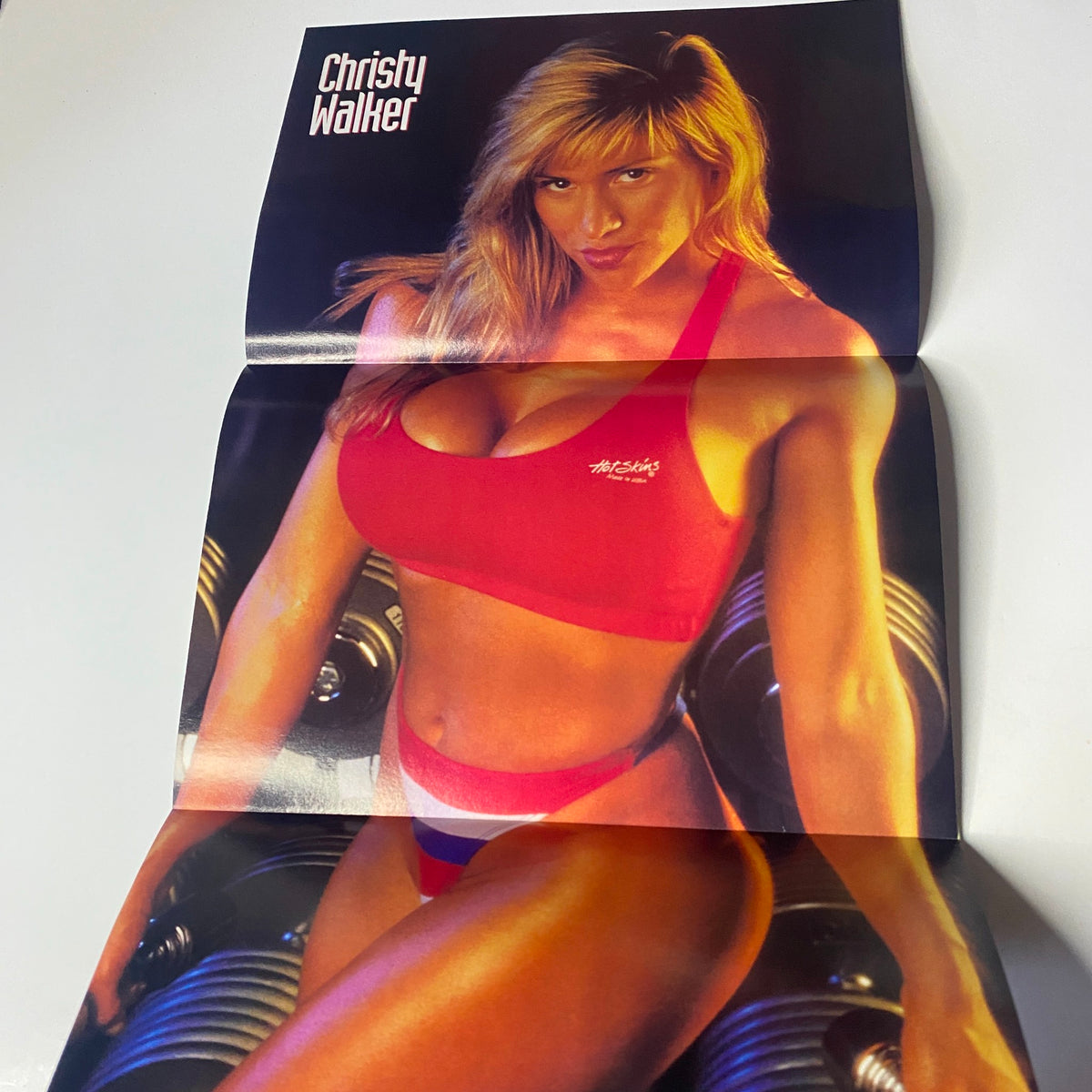 Fold-out poster from Muscular Development Magazine February 1995 featuring Christy Walker in a fitness pose, emphasizing bodybuilding aesthetics.