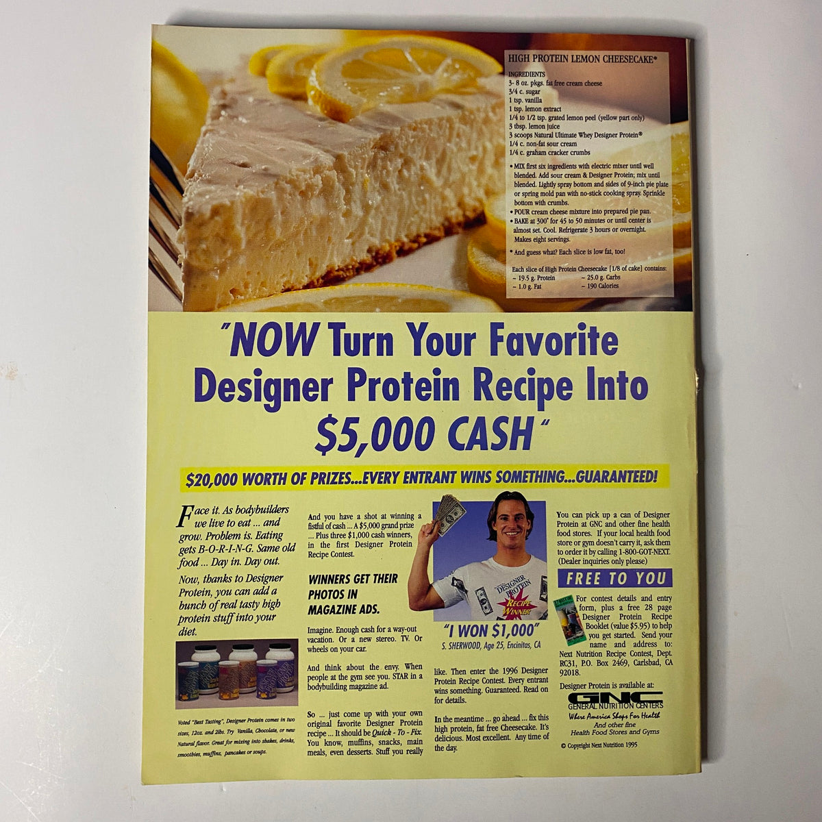 Back cover of Muscular Development Magazine December 1995 with a promotion for protein recipes and contests, highlighting community engagement in bodybuilding nutrition.