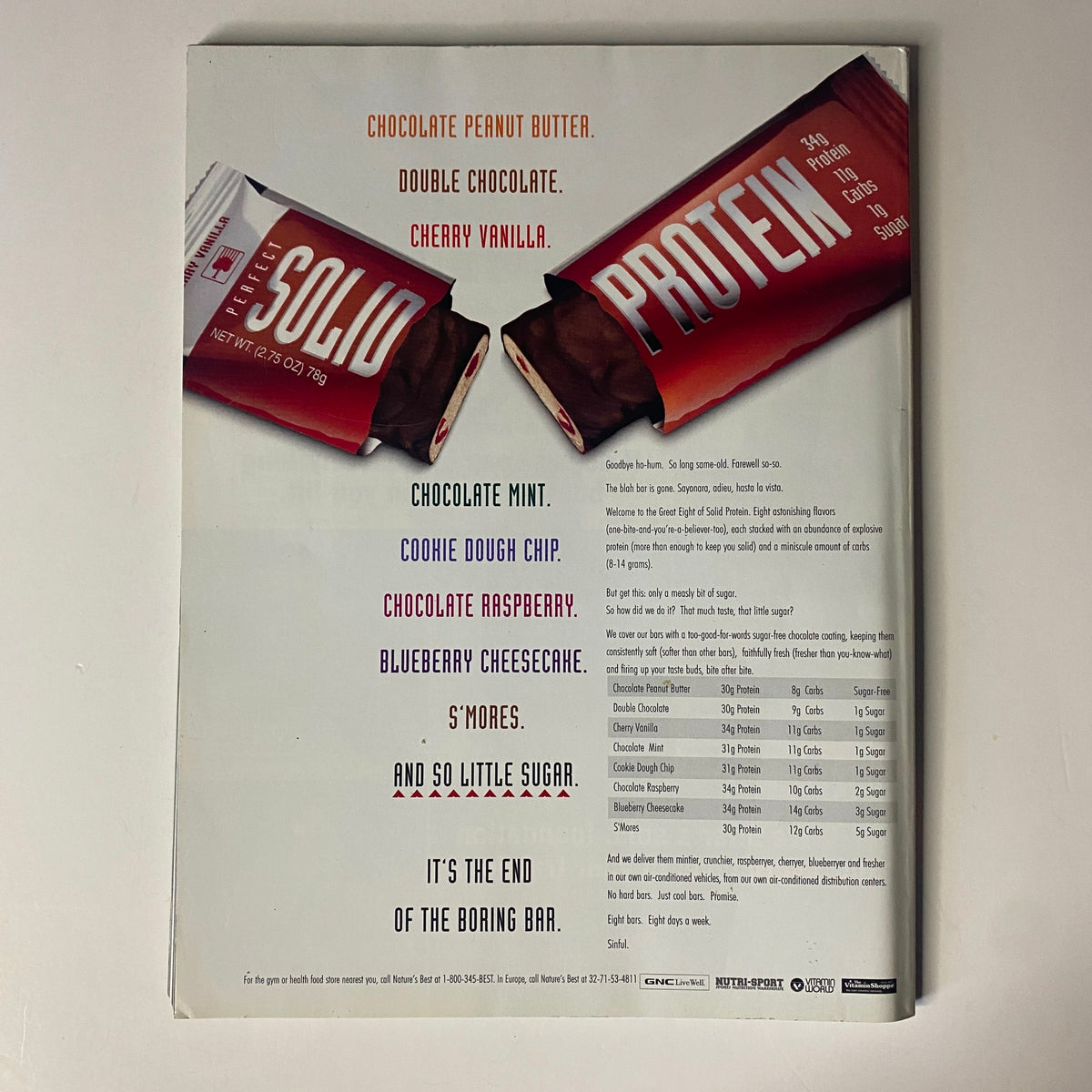 Back cover of Muscular Development Magazine May 2001 advertising various protein bars with a focus on flavors like 'Chocolate Mint' and 'Cookie Dough Chip'. Emphasizes fitness nutrition options featured in the magazine.