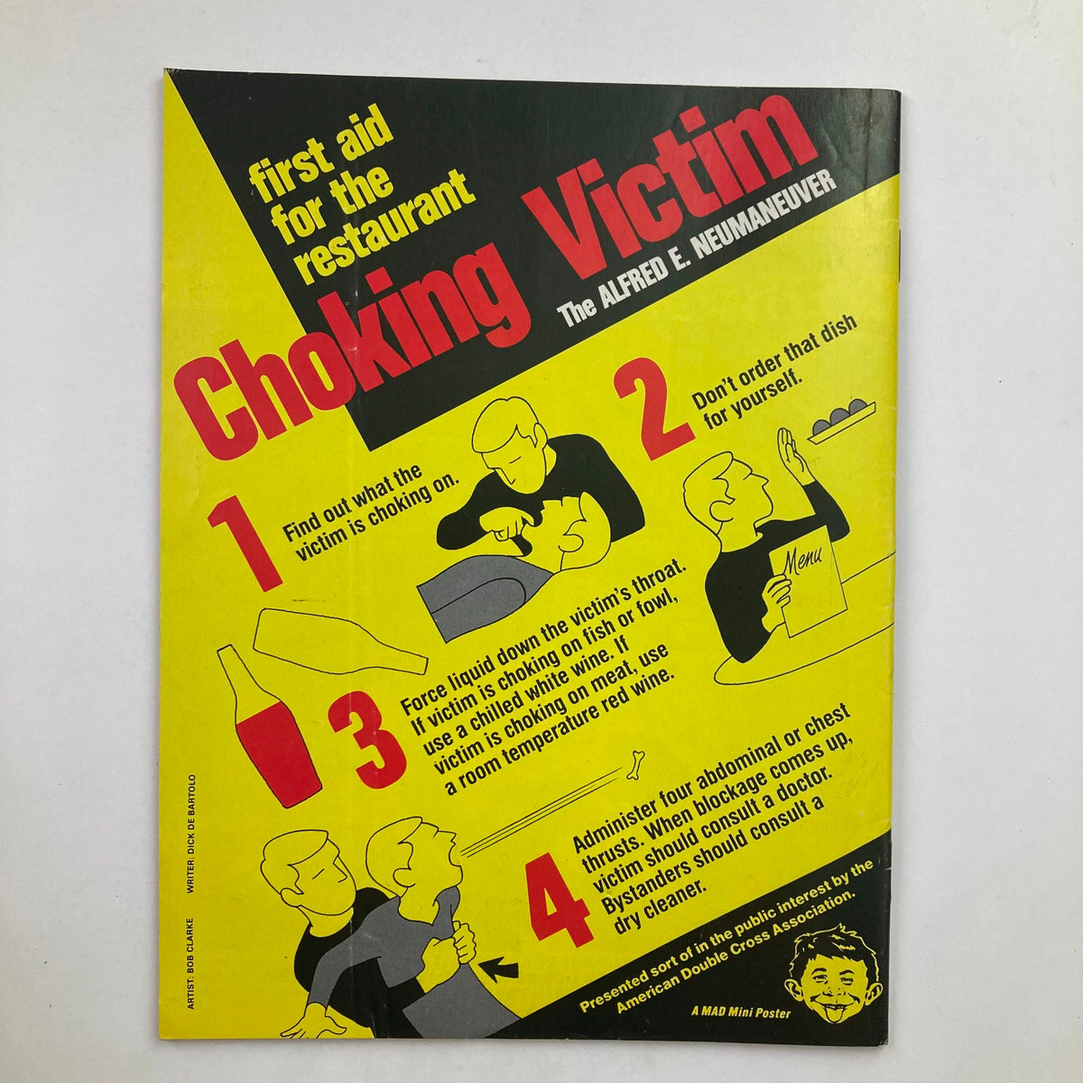 Mad Magazine December 1985 No. 259 mini poster titled 'First Aid for the Restaurant Choking Victim' by Alfred E. Neuman, illustrating comedic first aid steps.