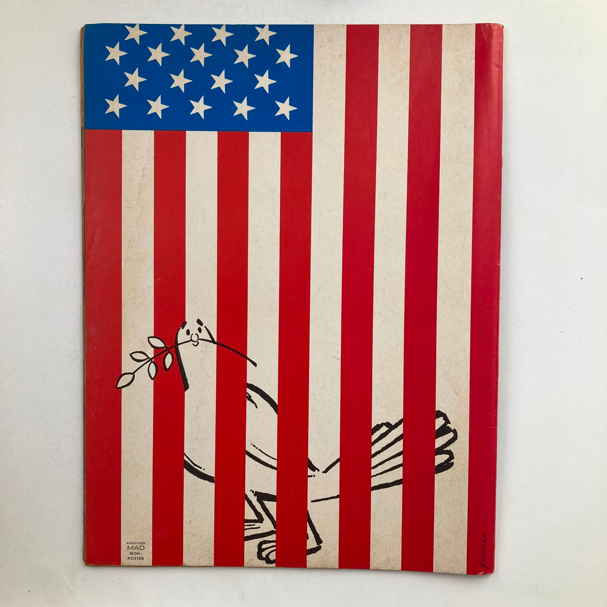 Back cover of Mad Magazine June 1972 No. 151 displaying an artistic depiction of the American flag with a bird carrying an olive branch.