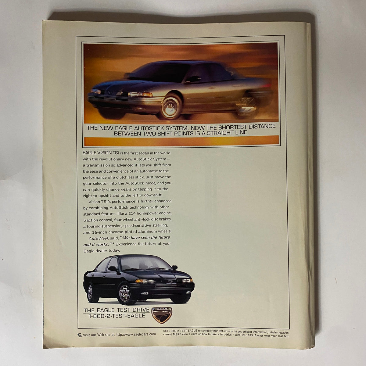 Back cover of George Magazine October - November 1995 featuring an advertisement for the Eagle Vision TSi. The ad promotes the new AutoStick system for smooth gear shifting. The stylish black Eagle Vision TSi is displayed alongside key features in an appealing design.