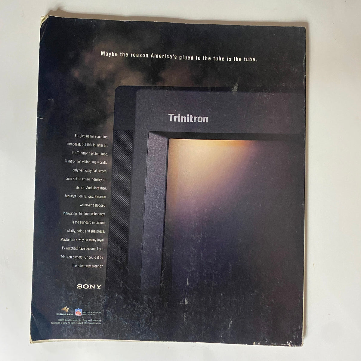 Back cover of George Magazine December 1996 featuring a Sony Trinitron television advertisement with text discussing its picture quality and viewer loyalty.