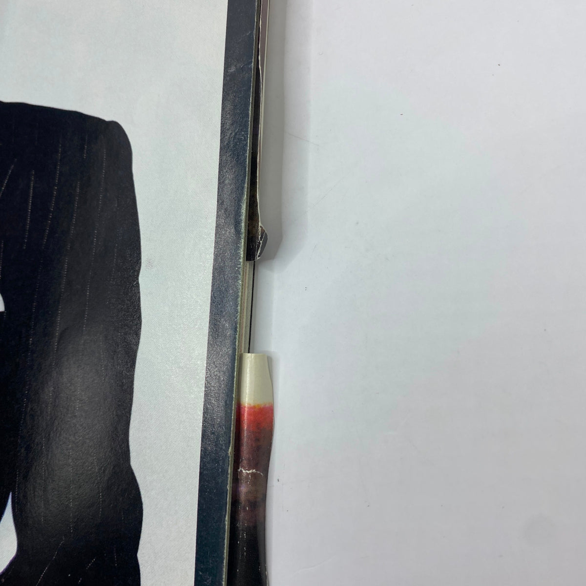 Close-up of the spine of the September 1996 George Magazine, illustrating the magazine's vintage quality and signs of wear.