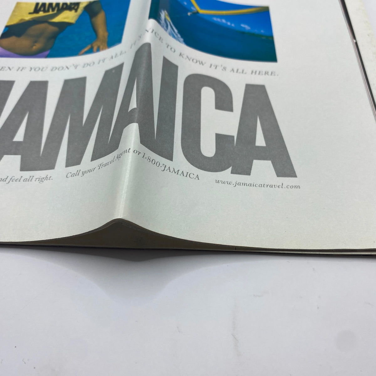 Another interior page of George Magazine May 1997, featuring an advertisement for Jamaica travel. The page presents vibrant imagery related to tourism.