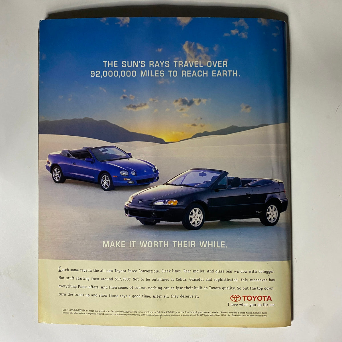 Advertisement from George Magazine May 1997 showcasing the Toyota Paseo Convertible and Celica. The ad promotes stylish and sleek designs, emphasizing the fun and quality of Toyota vehicles.