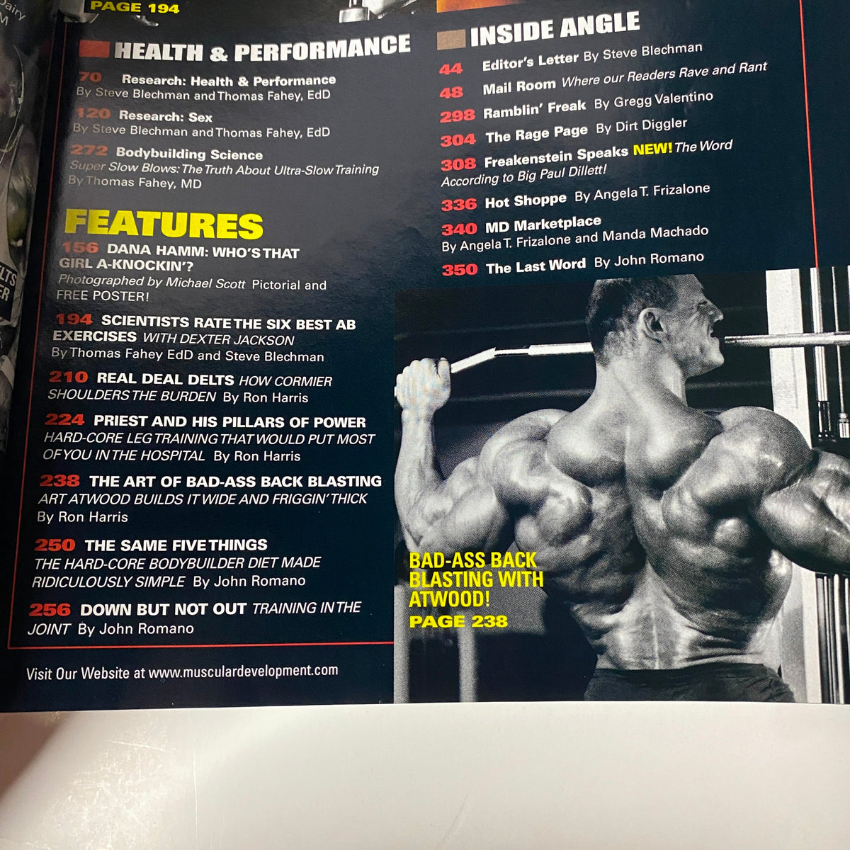 Inside page from Muscular Development Magazine May 2003 displaying features including Dana Hamm's pictorial and articles on bodybuilding science and training tips.