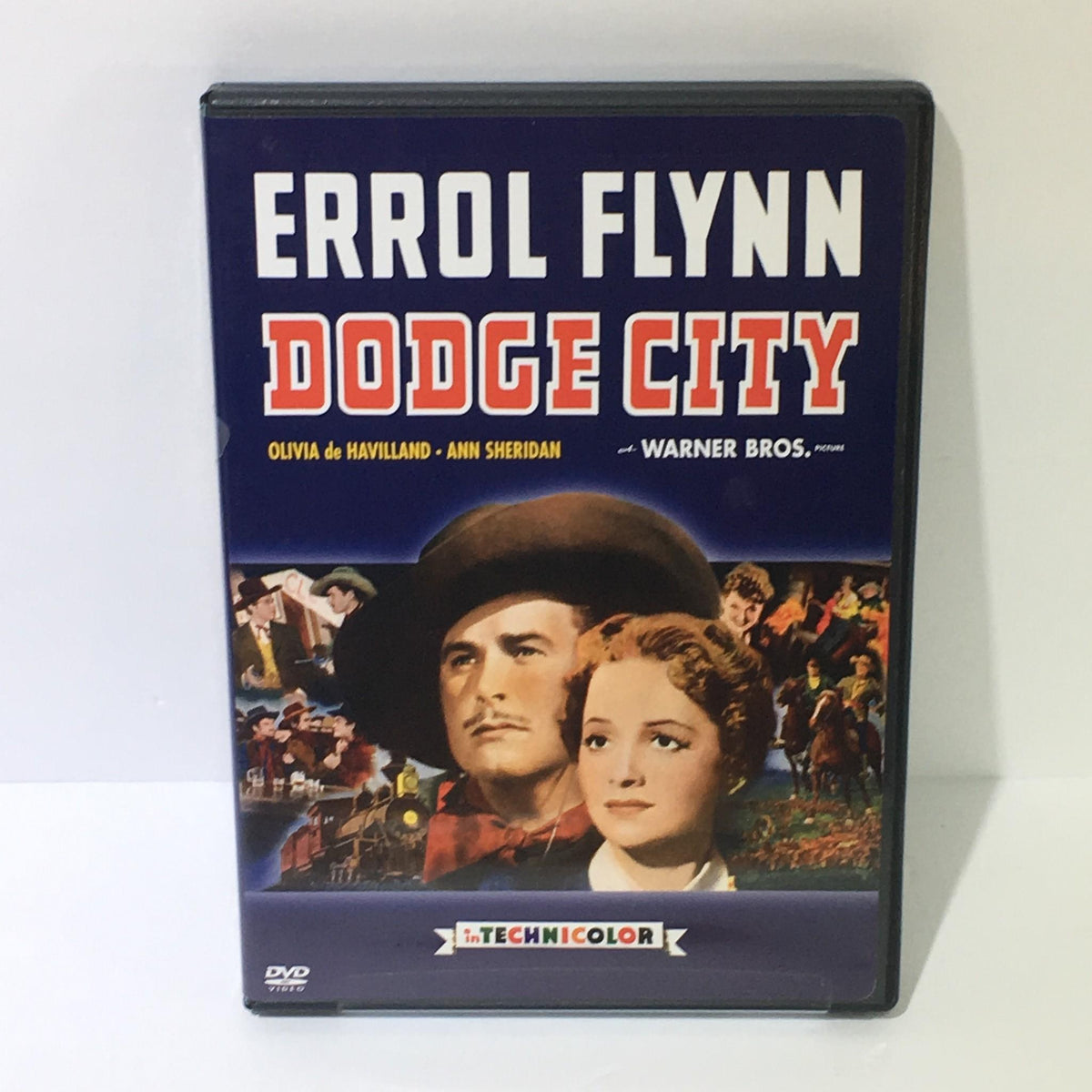 Errol Flynn Dodge City DVD cover featuring Olivia de Havilland and Ann Sheridan, showcasing a colorful Technicolor design from Warner Bros.
