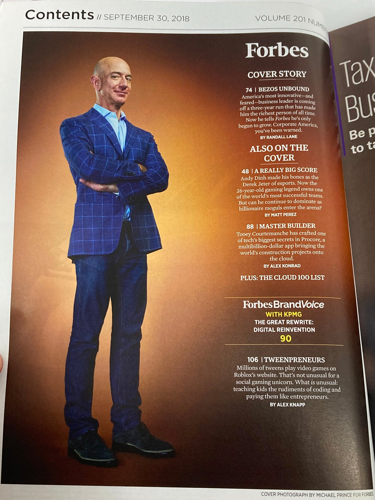 Interior page of Forbes Magazine from September 30, 2018, showcasing the contents including a cover story on Jeff Bezos. The image features Bezos in a stylish outfit, emphasizing his role in modern business and e-commerce.