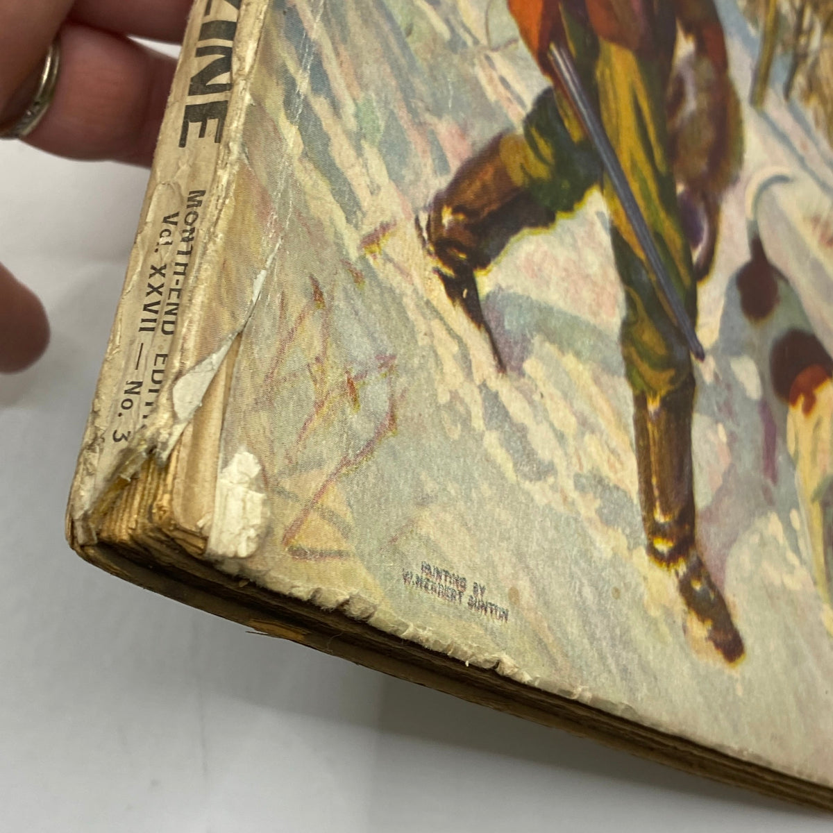 Side view of VTG The Popular Magazine February 15, 1913 illustrating the spine of the magazine, showing wear typical for its age.