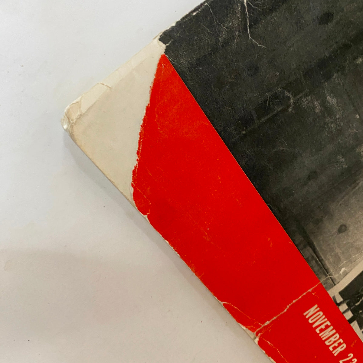 Close-up view of the top edge of VTG Life Magazine November 23, 1936, showing the wear and tear characteristic of vintage publications. The magazine highlights significant engineering achievements with a notable cover story.