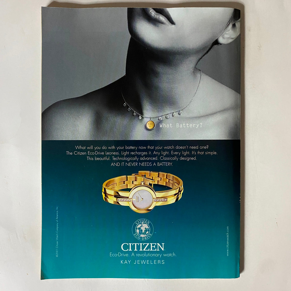 Advertisement from Tennis Magazine September 2001 for Citizen Eco-Drive watch, emphasizing its battery-free feature and stylish design, enhancing the magazine's appeal to collectors.