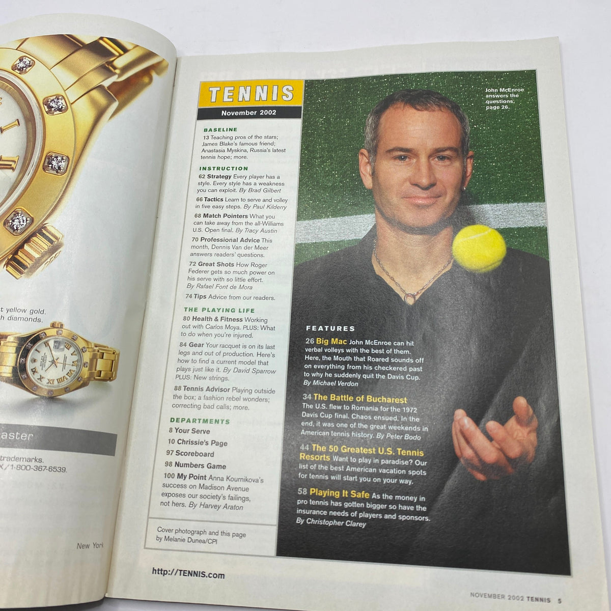 Inside page of Tennis Magazine November 2002 showcasing a feature on John McEnroe alongside a tennis theme and magazine details, offering insights into tennis history.