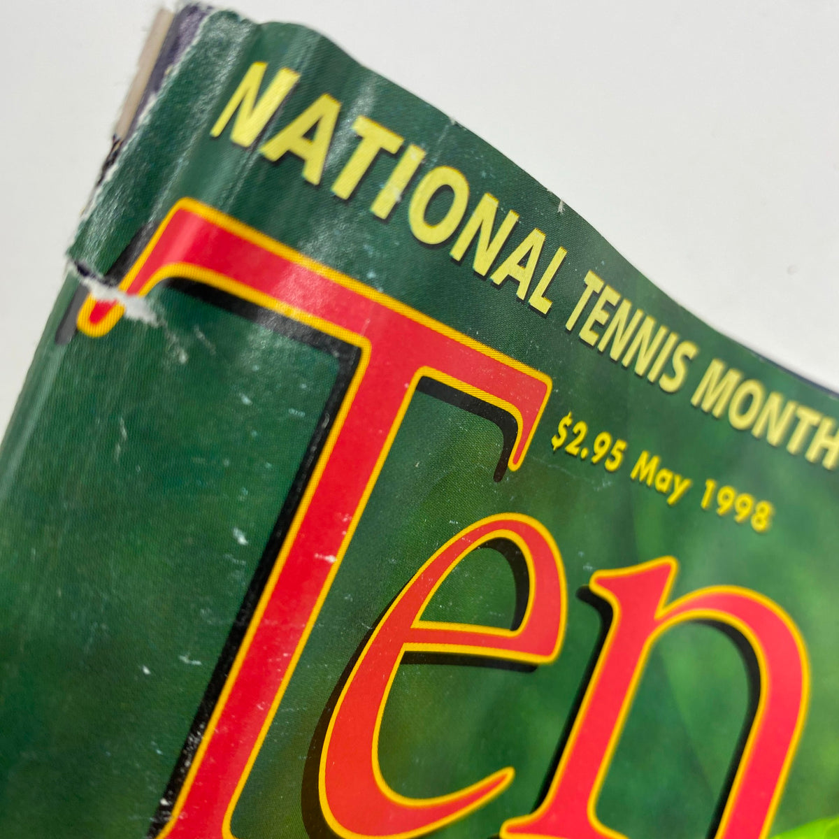 Close-up of the top edge of Tennis Magazine May 1998, highlighting the title and National Tennis Month promotion.