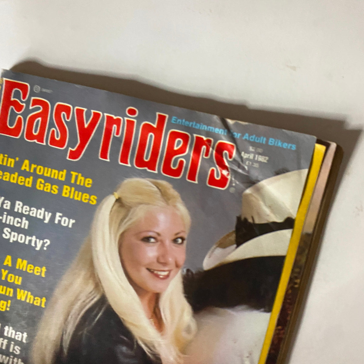 Close-up of the cover of VTG Easyriders Magazine April 1982 No. 106 Reviewin' Bikin' Haps showcasing a blonde model and the magazine's title.