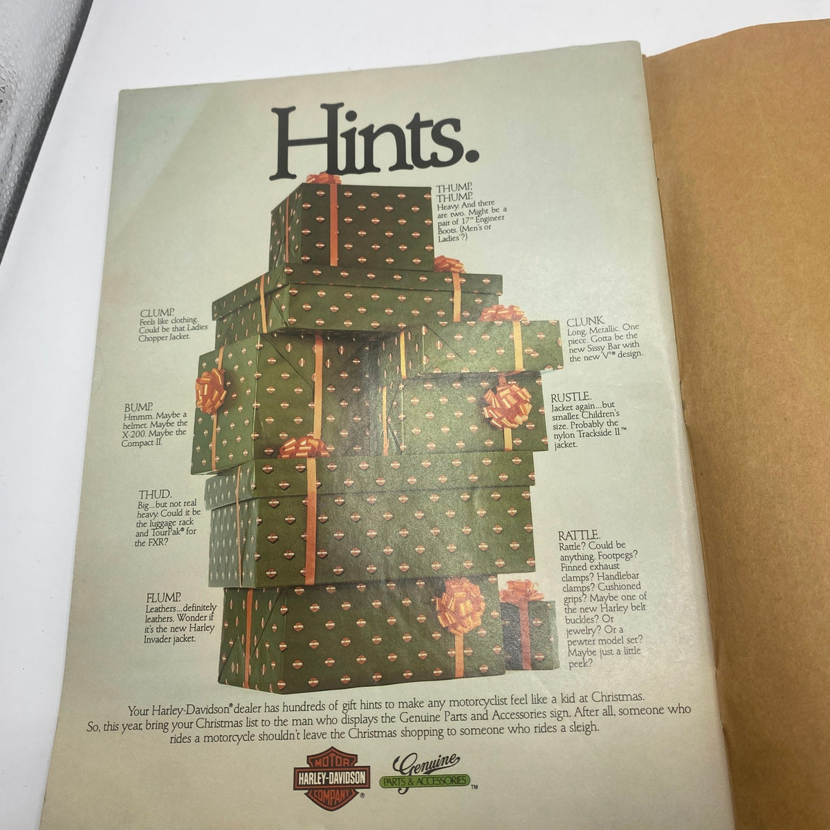 Page from the VTG Easyriders Magazine December 1983 providing holiday gift hints for motorcycle enthusiasts, featuring suggestions related to Harley-Davidson.