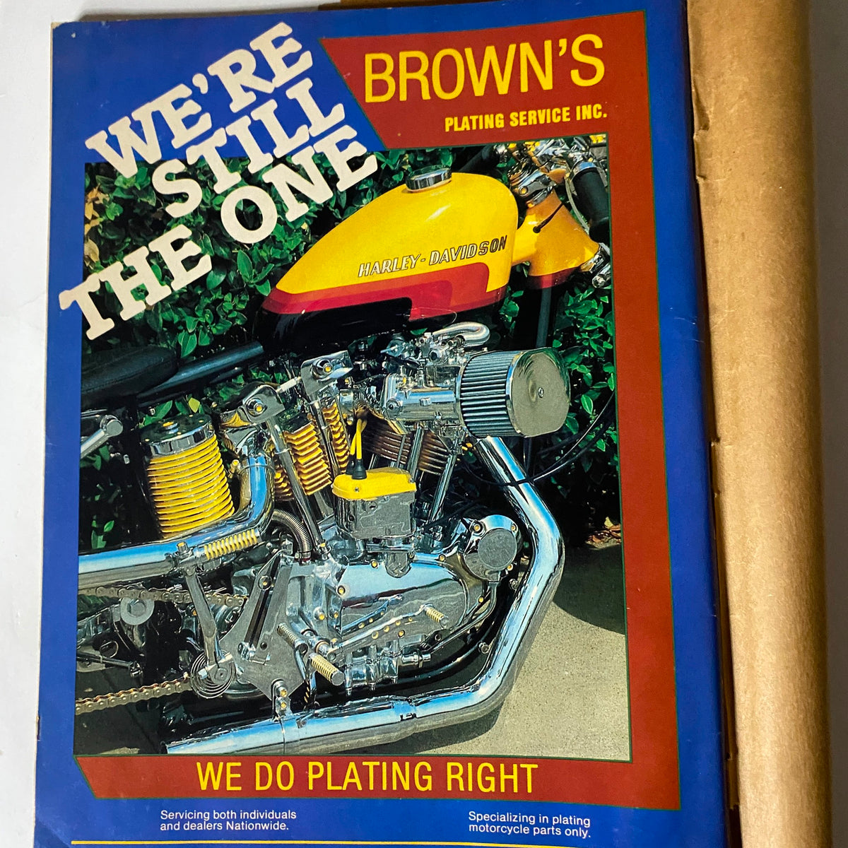 Promotional page from VTG Easyriders Magazine February 1984 for Brown's Plating Service, featuring a Harley-Davidson motorcycle engine with bright colors and a professional layout.