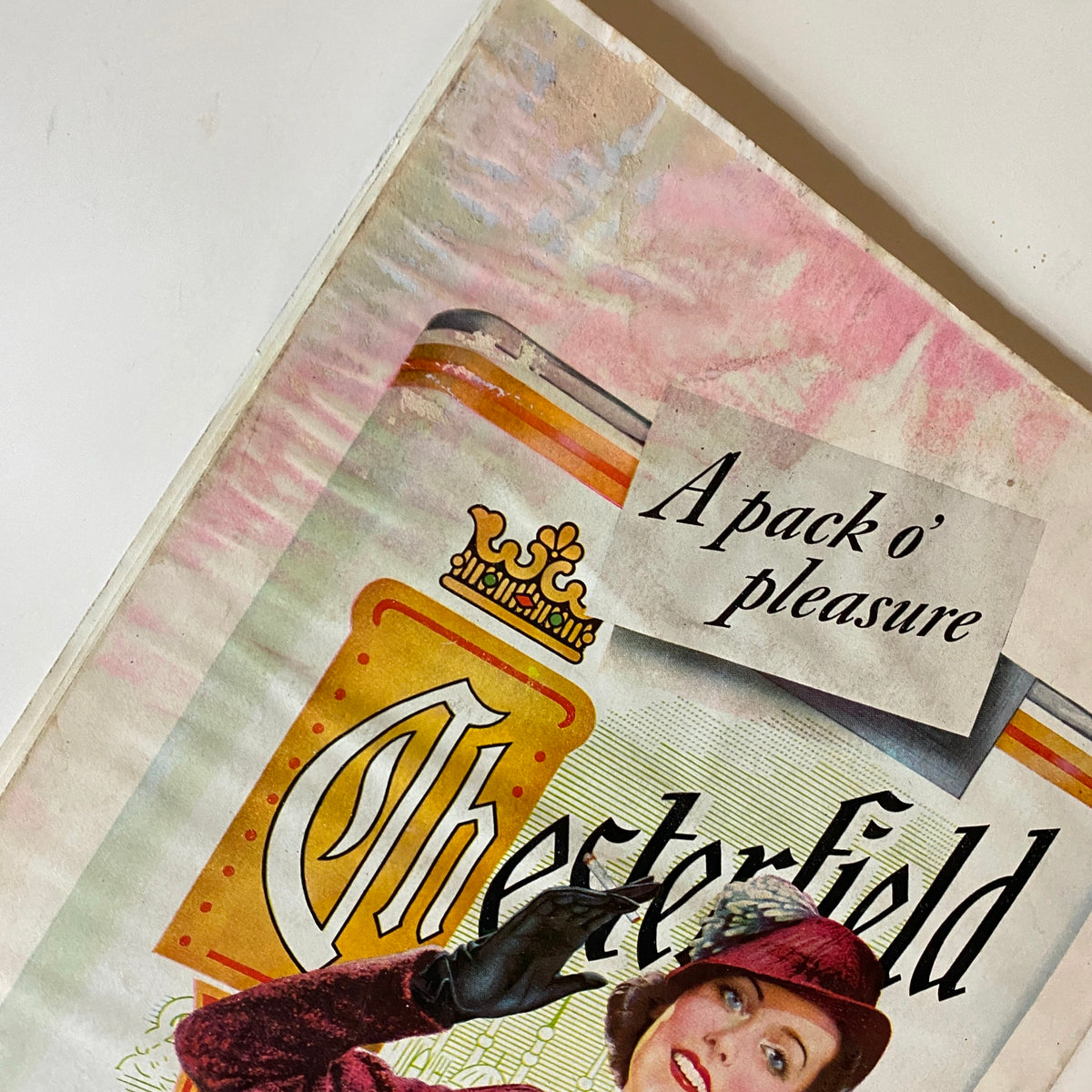 Close-up of the Chesterfield cigarettes advertisement from VTG The American Magazine November 1937, highlighting the tagline 'A pack o' pleasure' with vibrant colors and vintage design.