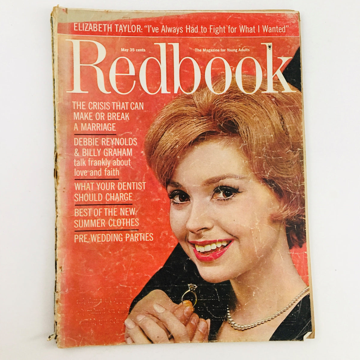 Cover of Redbook Magazine May 1961 featuring a smiling young woman with auburn hair and a ring, highlighting the interview with Debbie Reynolds and Billy Graham discussing love and faith.