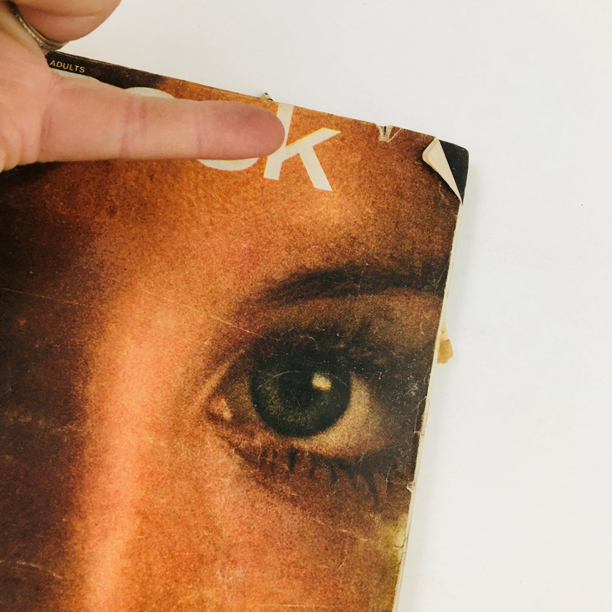 Detailing the cover of Redbook Magazine from March 1969 with Scotia McRae, focusing on the woman's eye and text elements indicating features of the issue.