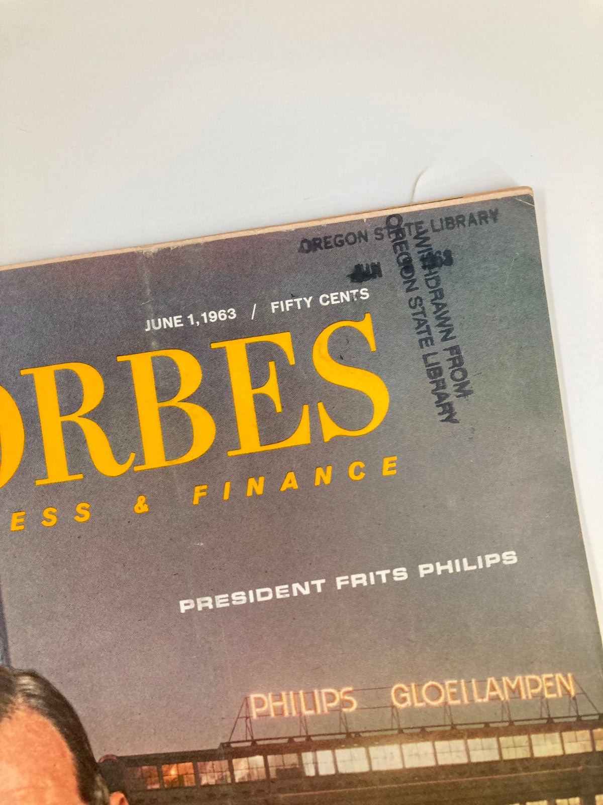 Close-up of the cover of VTG Forbes Magazine from June 1, 1963, highlighting the title and library withdrawal stamp.