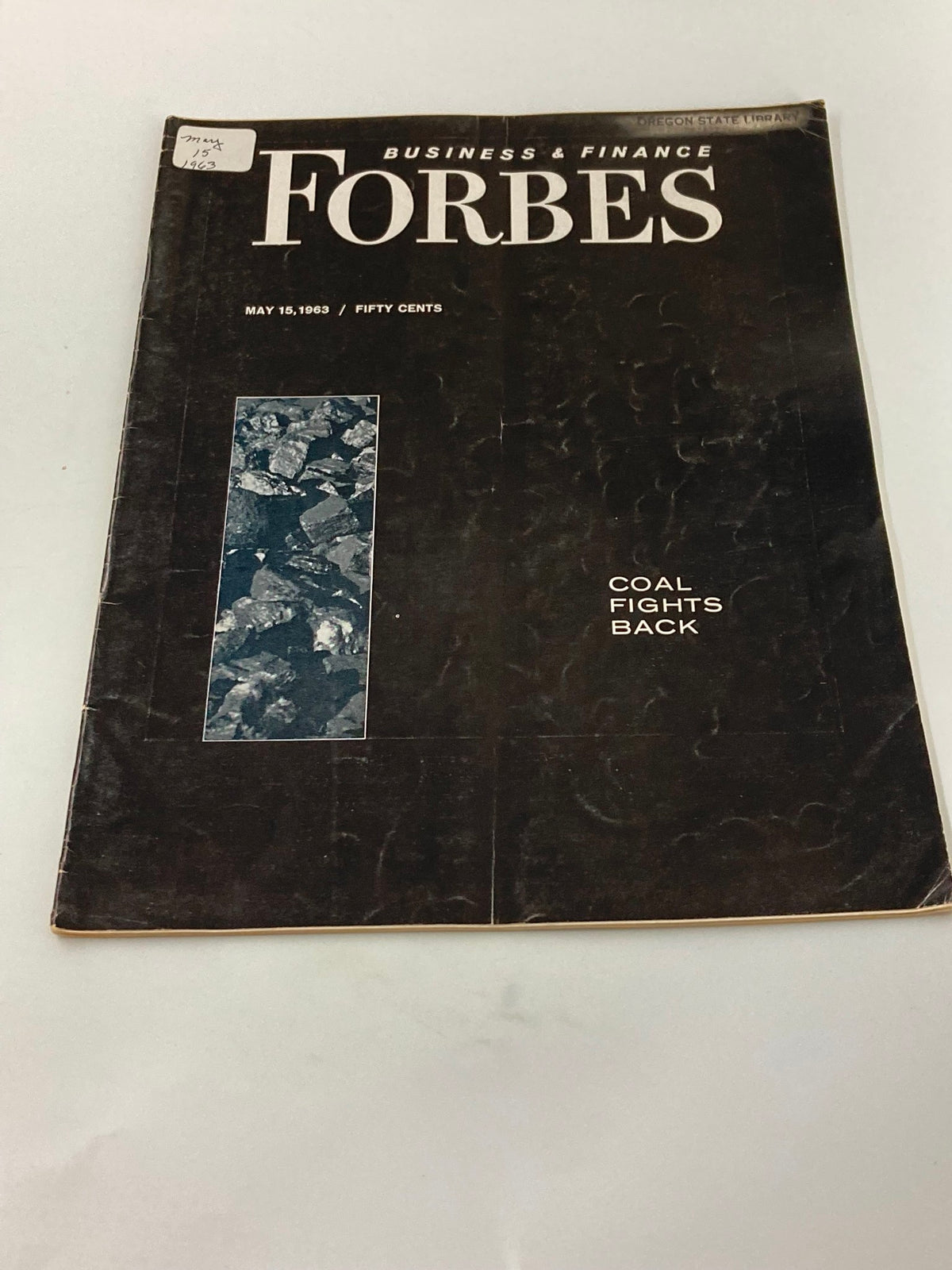 Close-up view of the cover of the Vintage Forbes Magazine dated May 15, 1963, featuring the title 'The Coal Fights Back' and a visual of coal on the cover.