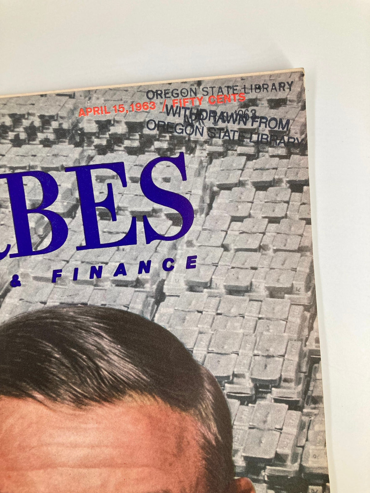 Close-up of the top section of the VTG Forbes Magazine April 15 1963, displaying the date, price, and 'Withdrawn from Oregon State Library' stamp.