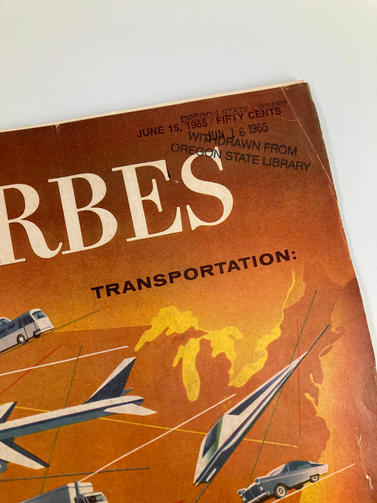 Vintage Forbes Magazine Cover from June 15, 1965 featuring a bold design and the title 'FORBES'. The cover has a stamp indicating it was withdrawn from Oregon State Library.