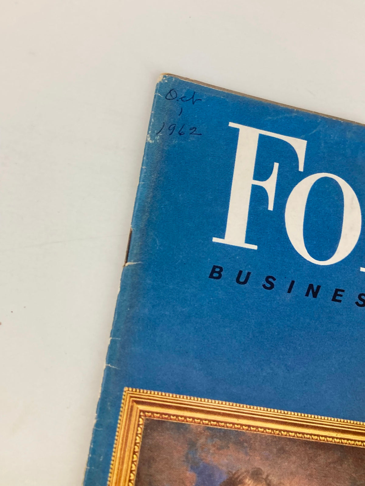 Close-up of the corner of VTG Forbes Magazine, October 1, 1962, showing the publication date and title, emphasizing its historical significance.
