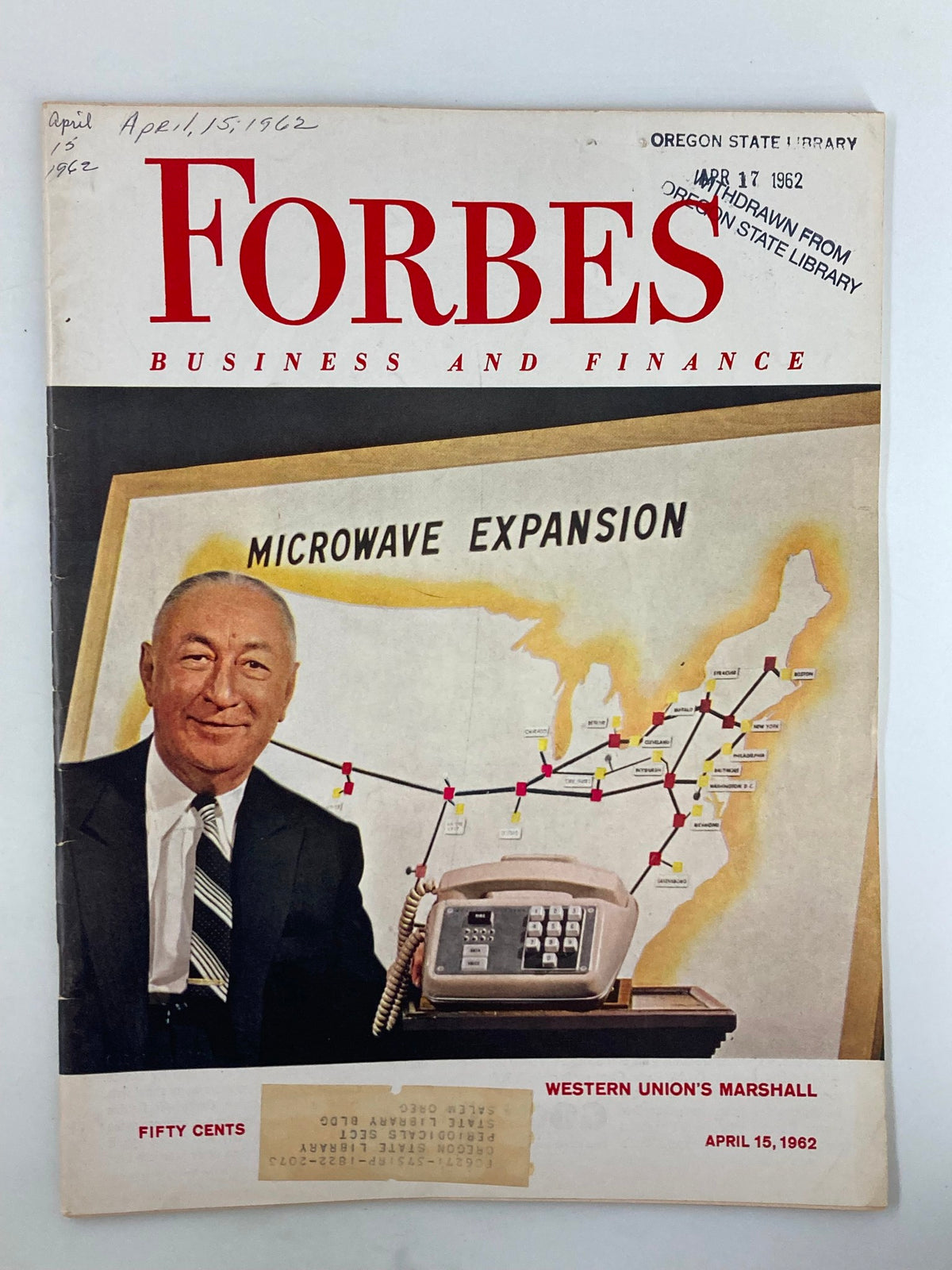 Cover of the VTG Forbes Magazine dated April 15, 1962, featuring the headline 'Microwave Expansion' with an image of a man standing next to a telephone and a map depicting Western Union's Marshall expansion efforts.