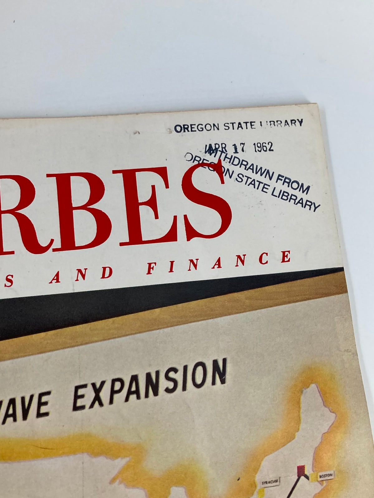 Cover of VTG Forbes Magazine April 15 1962 featuring the title prominently displayed and a withdrawal stamp from Oregon State Library, highlighting its vintage significance.