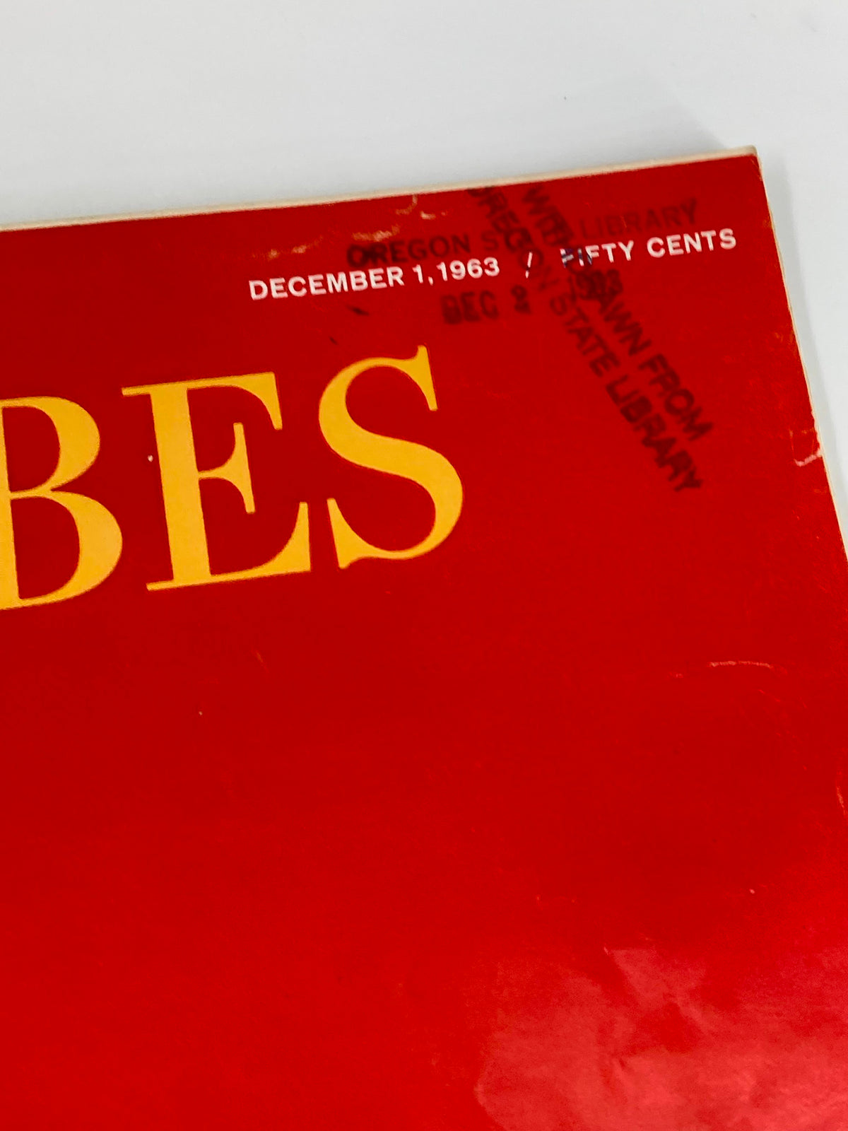 Close-up of the top section of VTG Forbes Magazine December 1, 1963, indicating the publication date and library stamp.