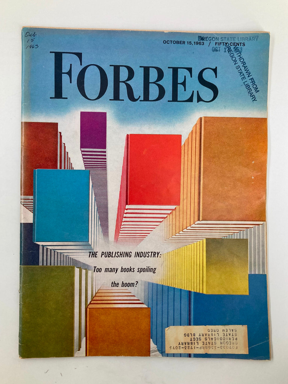 Cover of VTG Forbes Magazine from October 15, 1963, featuring colorful graphics with stacked books and the title 'The Publishing Industry: Too many books spoiling the boom?'.