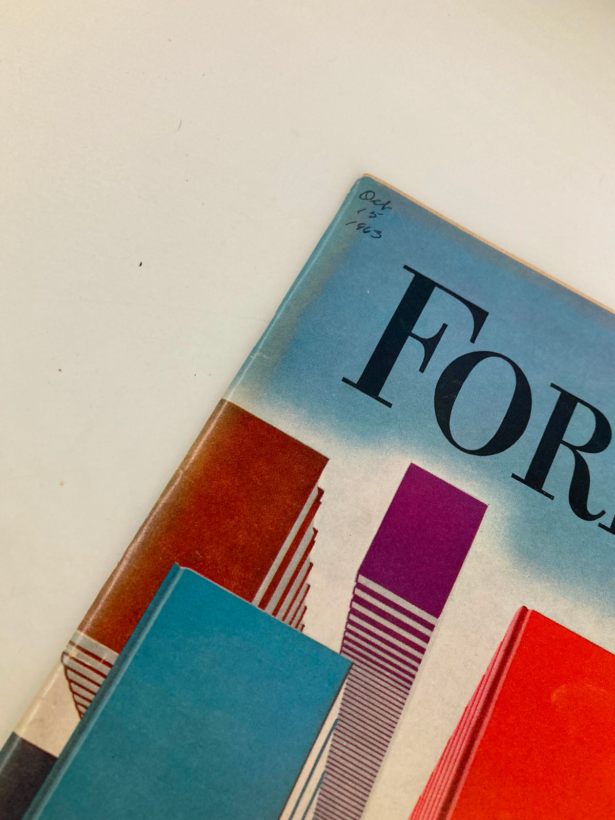 Side perspective of the VTG Forbes Magazine from October 15, 1963, detailing the magazine title and date with handwritten annotation on the upper corner.