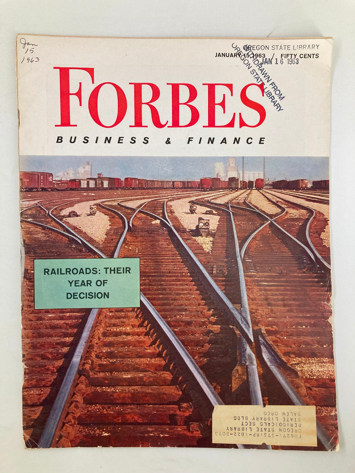 Cover of Forbes Magazine from January 15, 1963, featuring the title 'Railroads: Their Year of Decision', showcasing railroad tracks and freight cars.