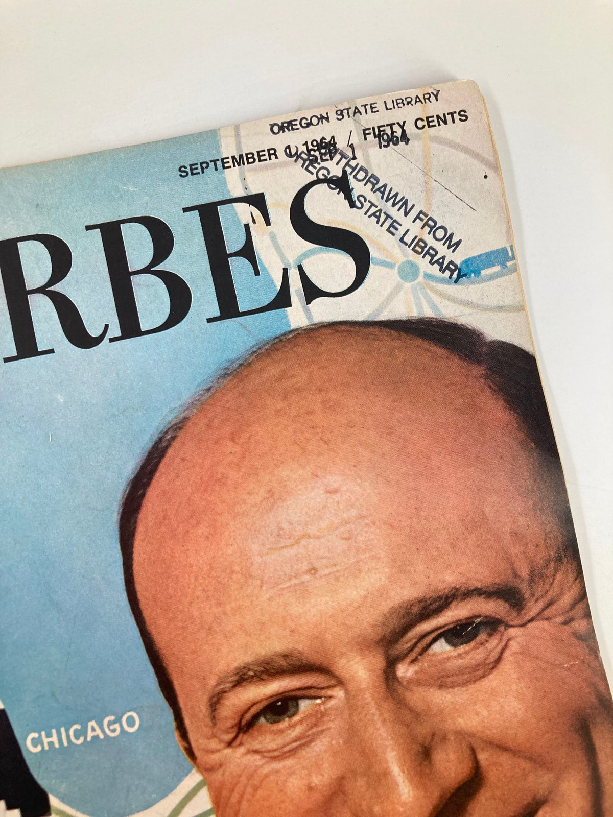 Close-up of the cover of VTG Forbes Magazine September 1, 1964, highlighting the title and date, along with a library stamp indicating it was withdrawn from the Oregon State Library.