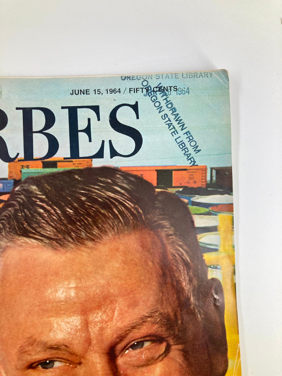 Top section of the cover of VTG Forbes Magazine June 15, 1964 displaying the date and title alongside a stamp indicating withdrawal from the Oregon State Library.