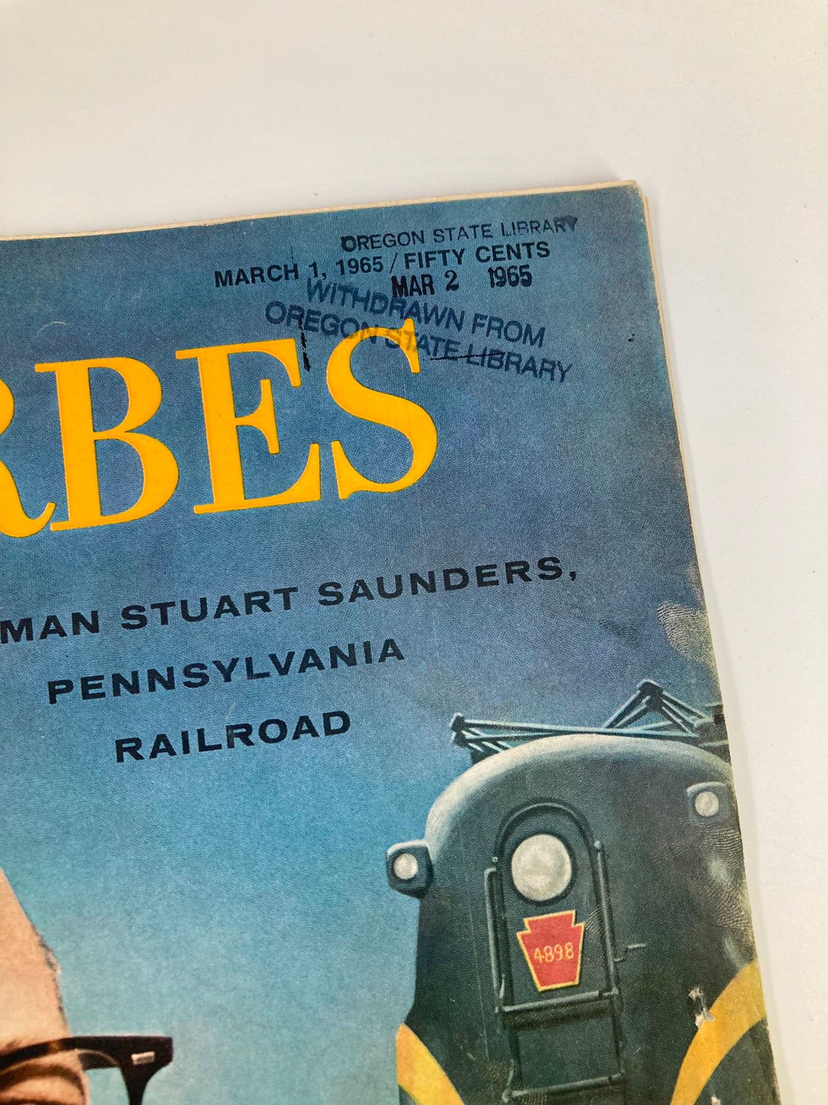 Cover of VTG Forbes Magazine March 1, 1965, featuring Chairman Stuart Saunders of the Pennsylvania Railroad with library withdrawal stamp.