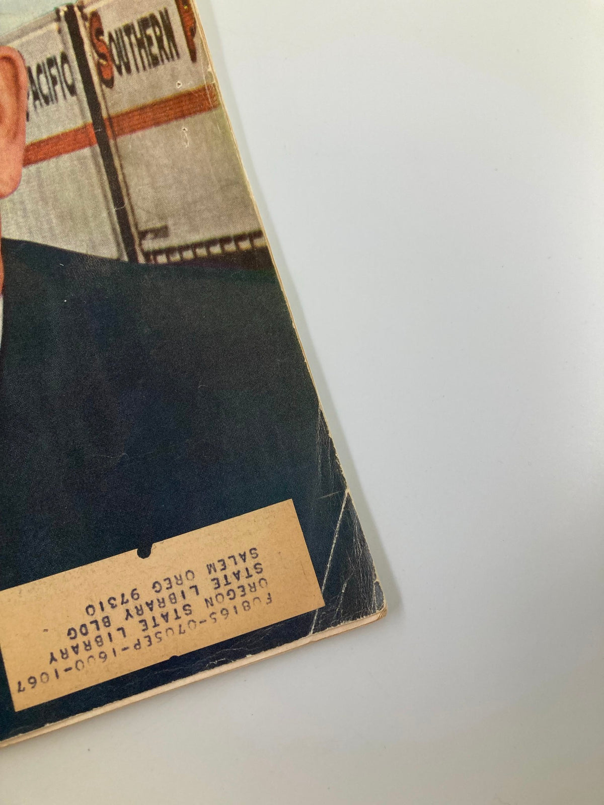 Side view of the Forbes Magazine cover from November 1, 1965, showing a label from Oregon State Library. This vintage magazine features an article on Southern Pacific's Donald Russell, representing mid-20th century business leadership.