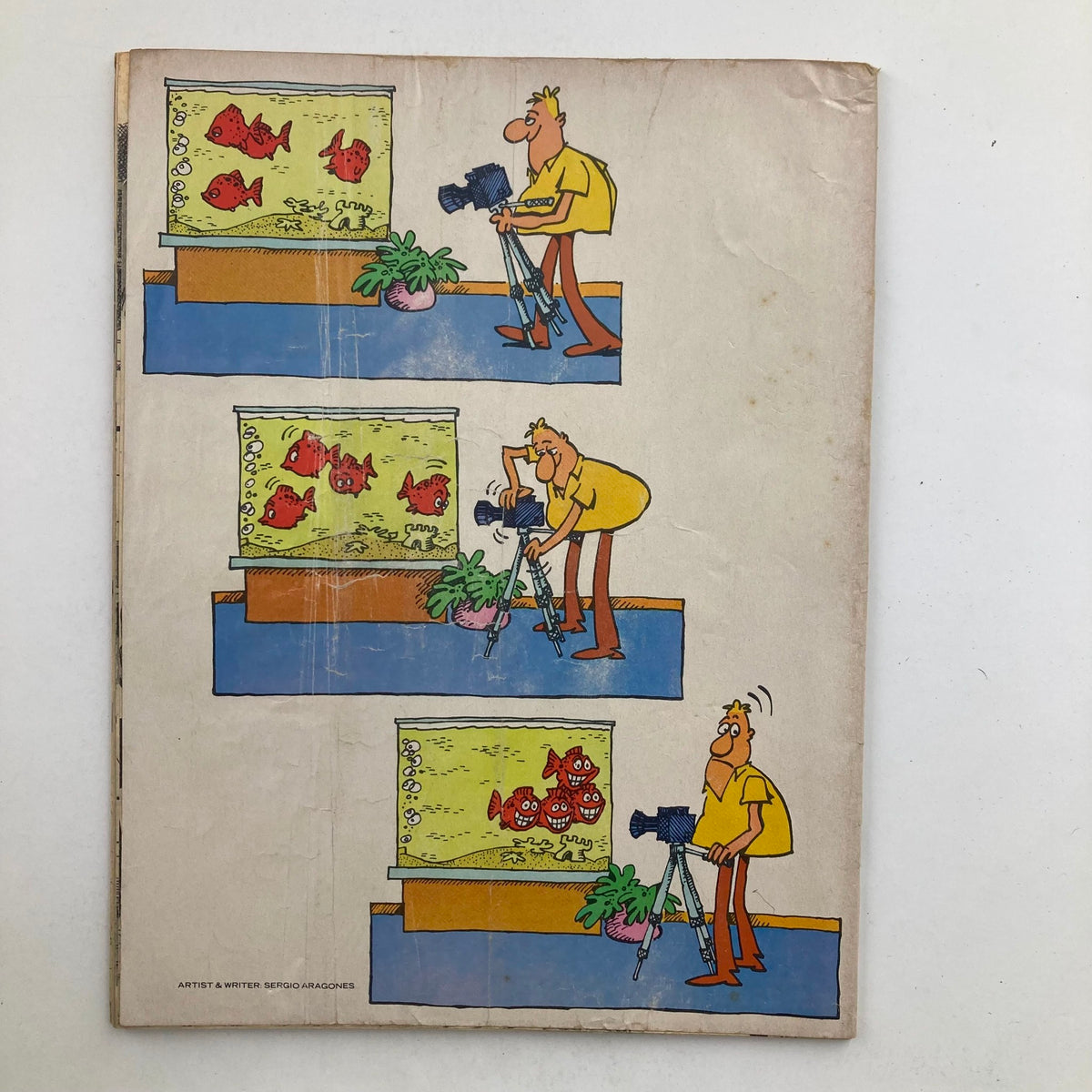 Back cover of Mad Magazine March 1979 No. 205 showing a humorous cartoon strip about photography.