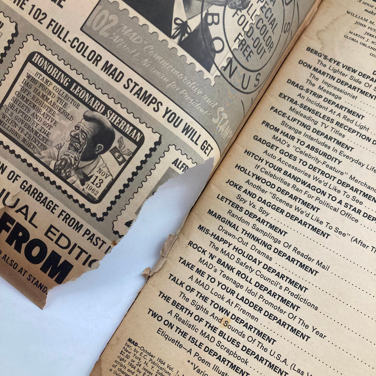 Interior page of Mad Magazine October 1964 No. 90 showing advertisements and article listings, capturing the vintage feel and humorous content of the publication.