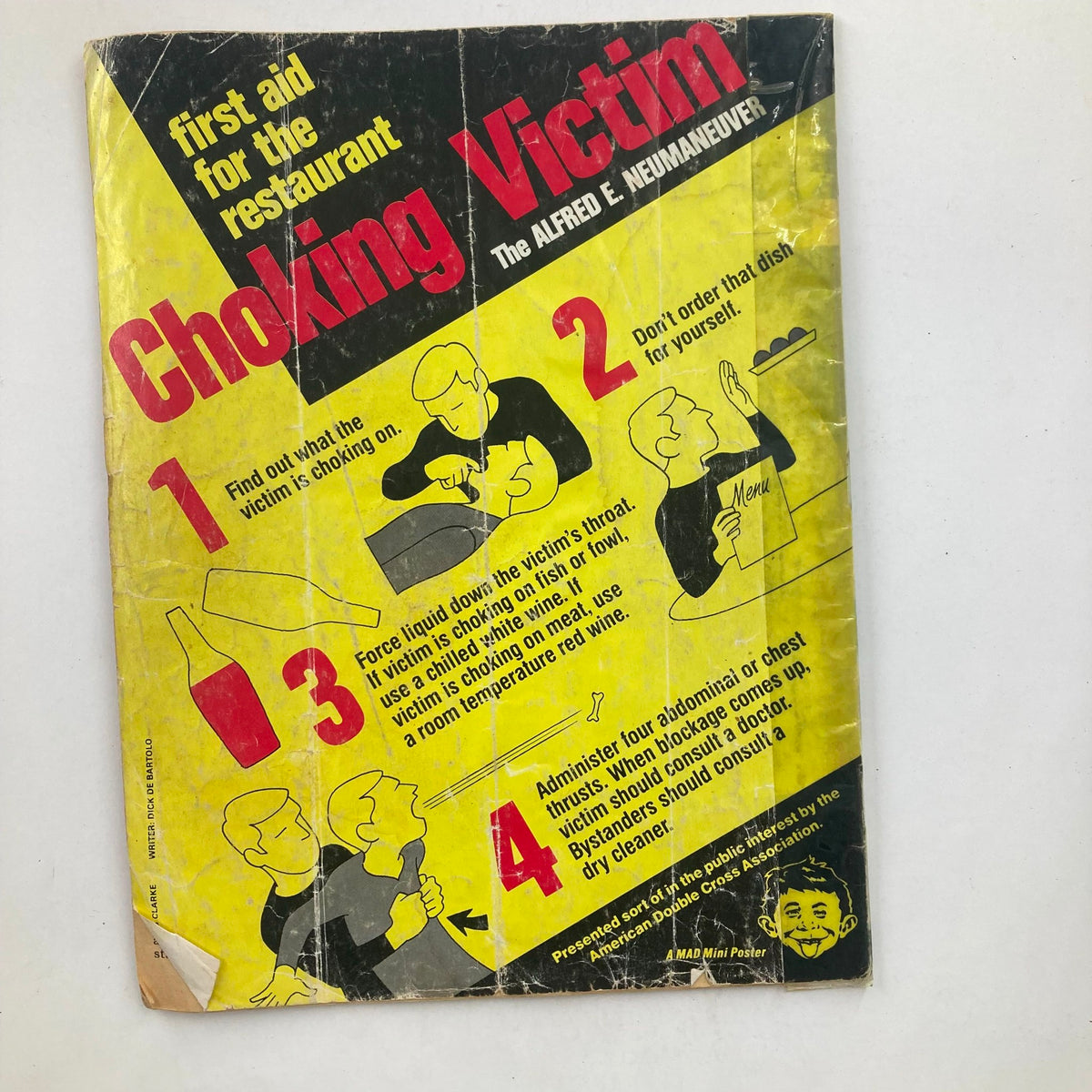 Back cover of Mad Magazine December 1985 No. 259, featuring a humorous 'Choking Victim' first aid guide with illustrated steps, embodying the satirical and whimsical spirit of Mad Magazine.