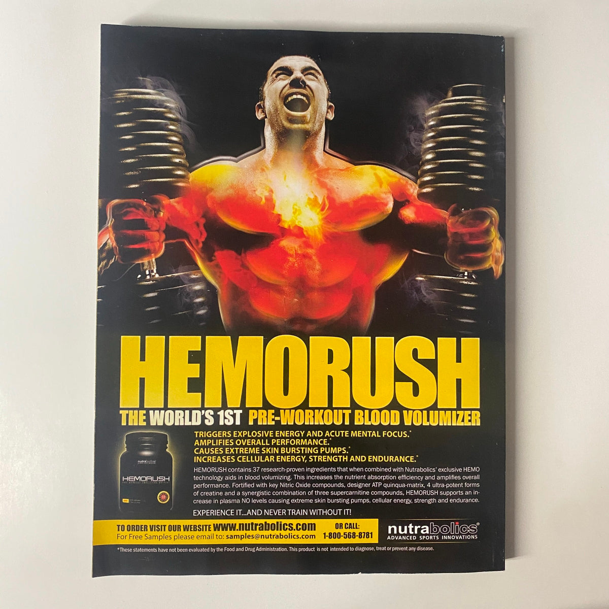Advertisement for Hemorush, a pre-workout blood volumizer, in Muscular Development Magazine December 2009, showcasing its benefits for energy and endurance.