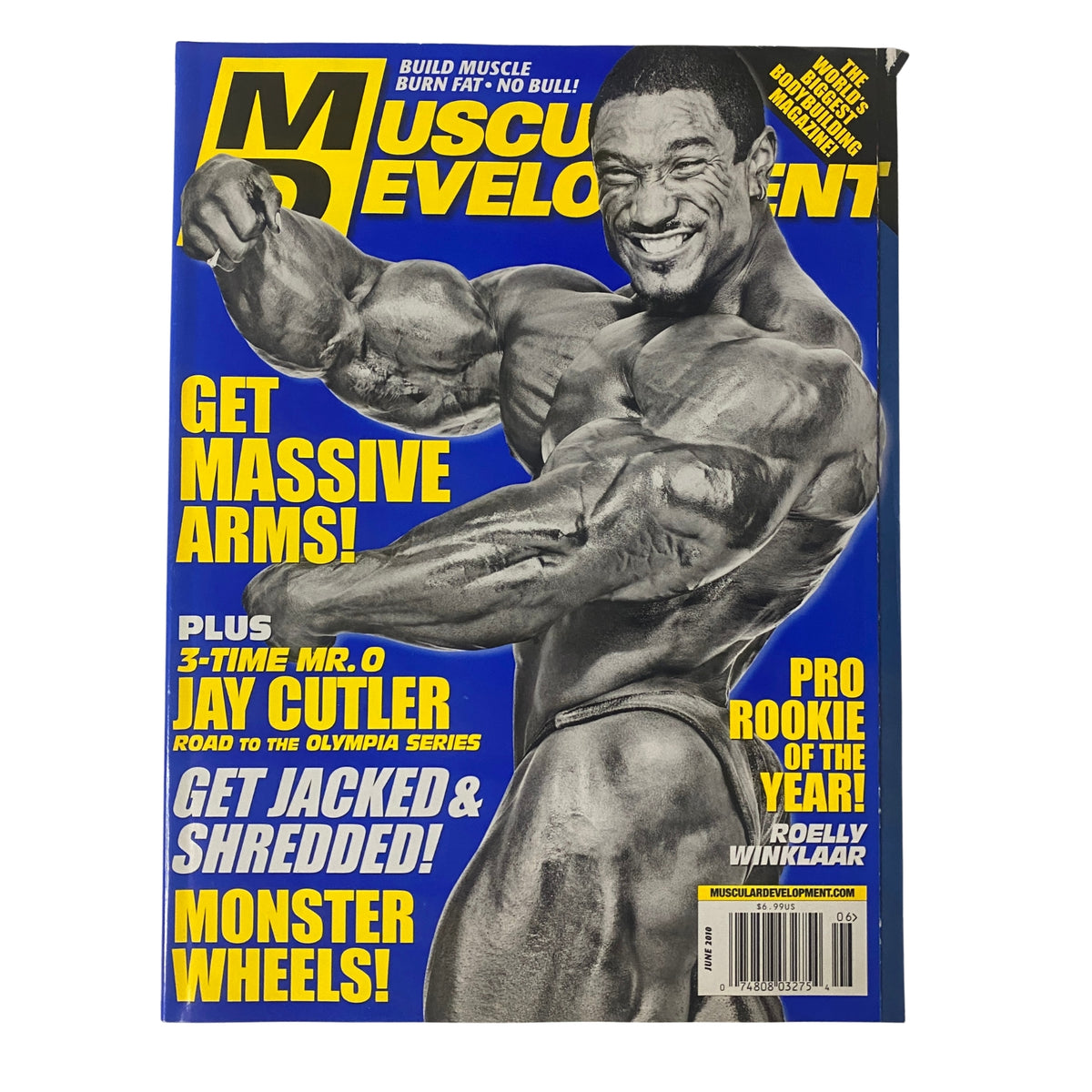 Muscular Development Magazine June 2010 Vol 47 No. 6 featuring bodybuilder Roelly Winklaar on the cover, showcasing his physique with a smile, promoting fitness and bodybuilding enthusiasm.