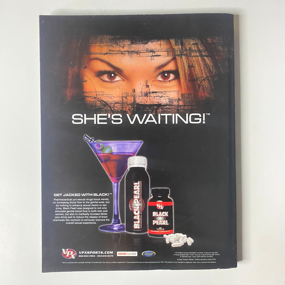 Back cover of Muscular Development Magazine July 2005, Vol 42 No. 7 featuring an advertisement for a fitness product with an eye-catching design.
