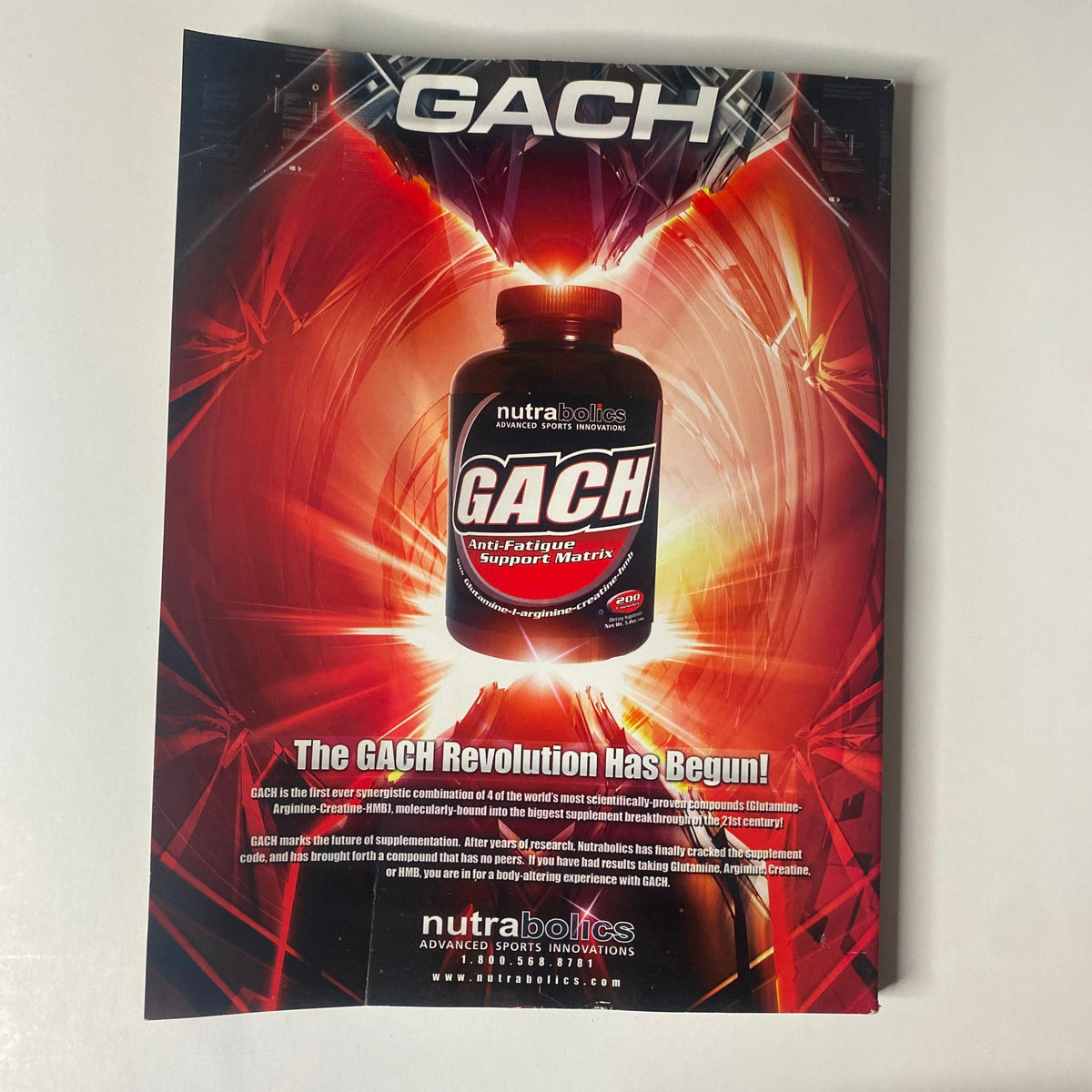 Cover page of Muscular Development Magazine February 2006 featuring Gustavo Badell with the caption 'The GACH Revolution Has Begun!' promoting NutraBolt's GACH supplement. Suitable for bodybuilding enthusiasts and collectors.
